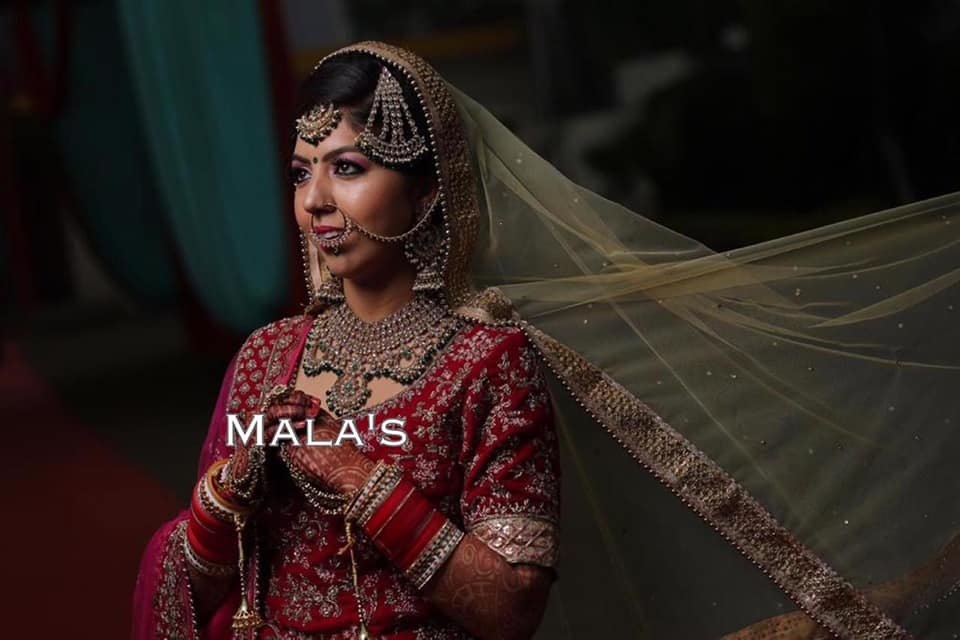 Mala\'s Salon Make-up Studio & Academy logo